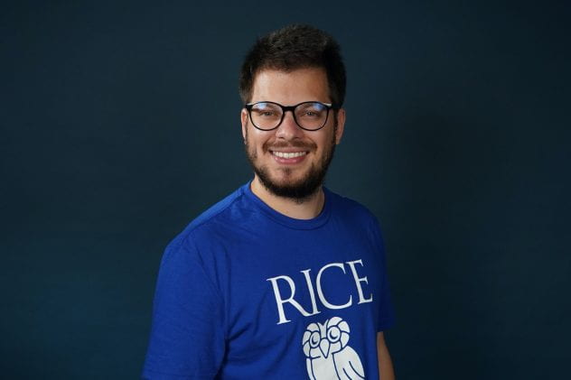 Student portrait with a blue background